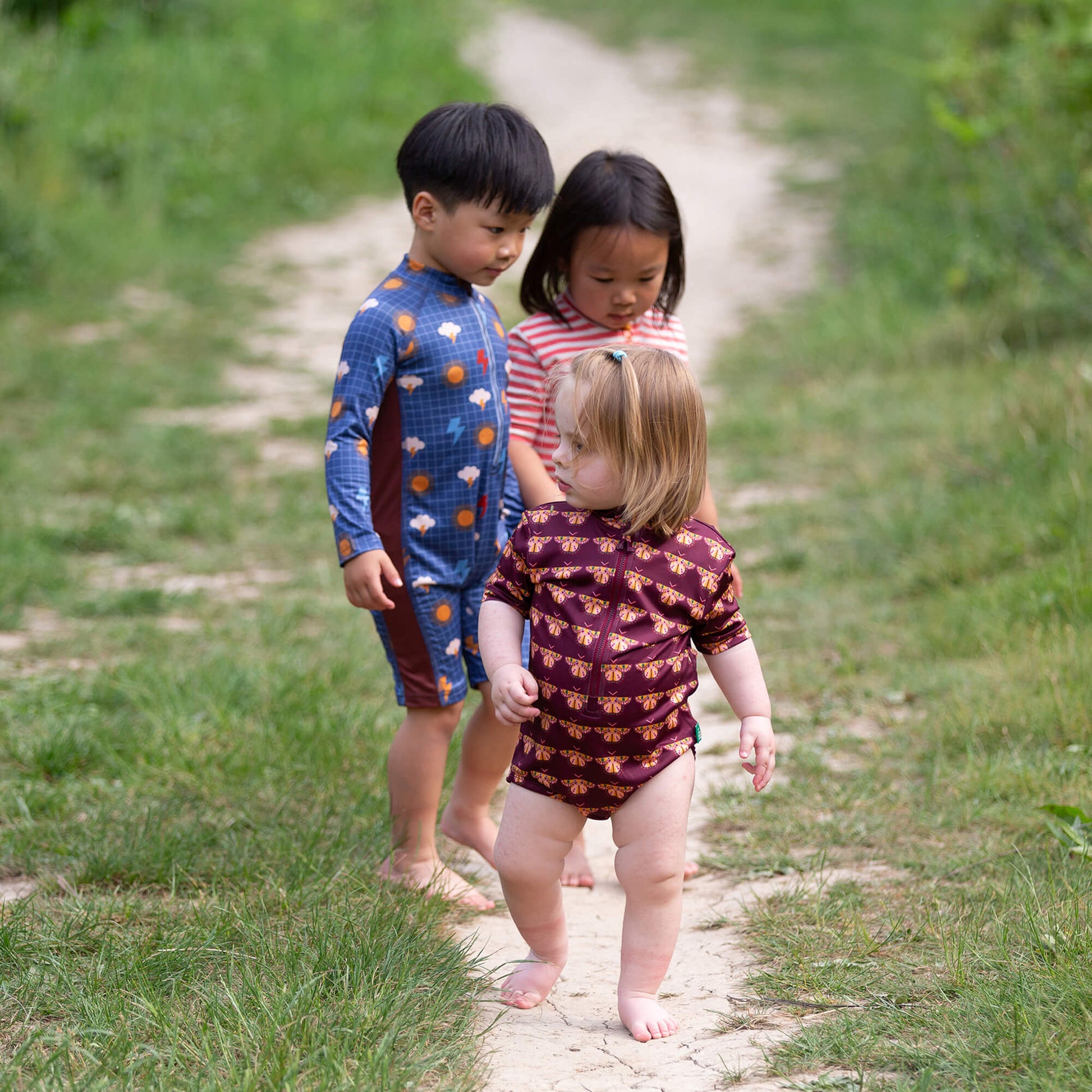 Berry Butterflies UPF 50 Recycled Short Sleeve Swimsuit Multi / 7-8y