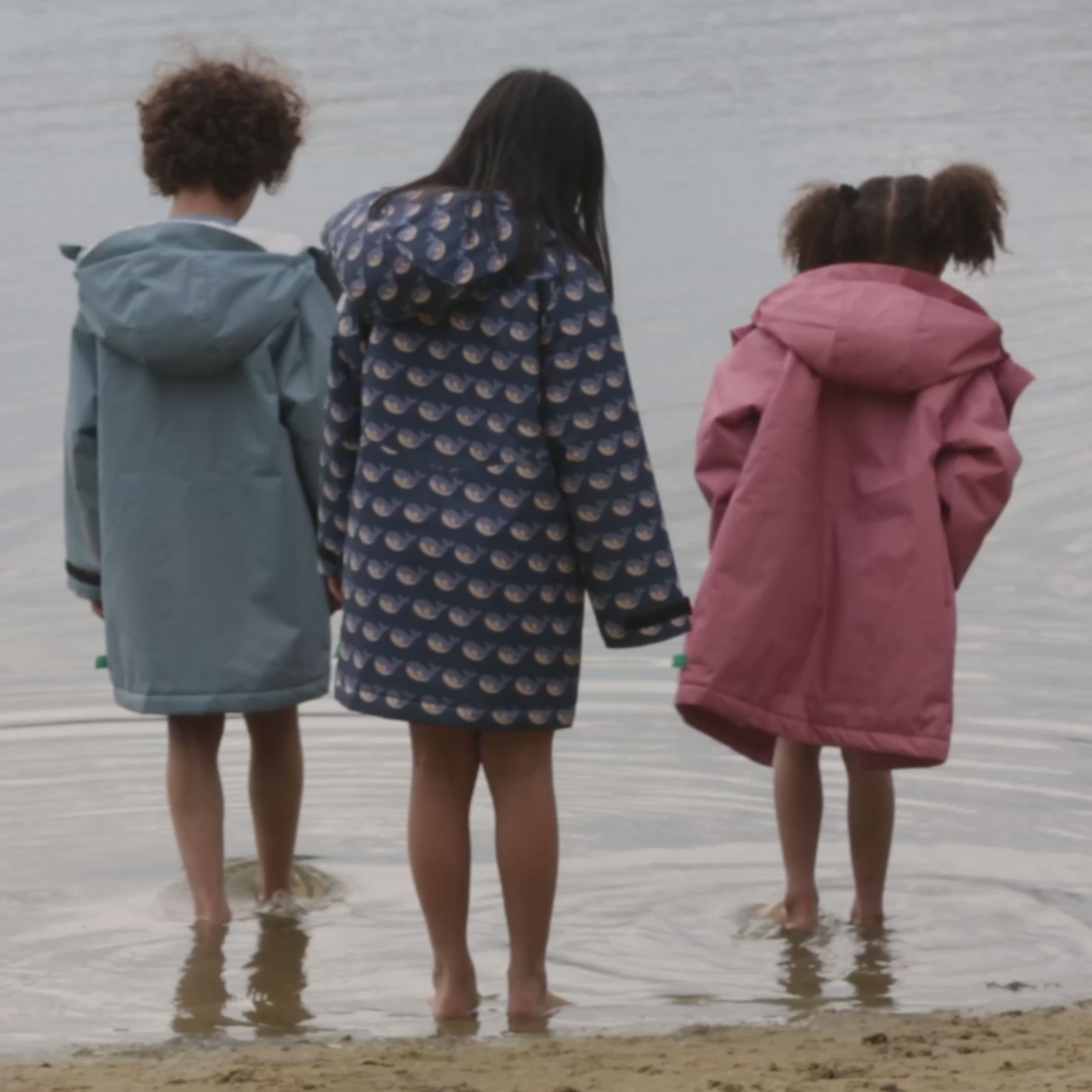 Load video: Singing Whales Recycled Waterproof Robe