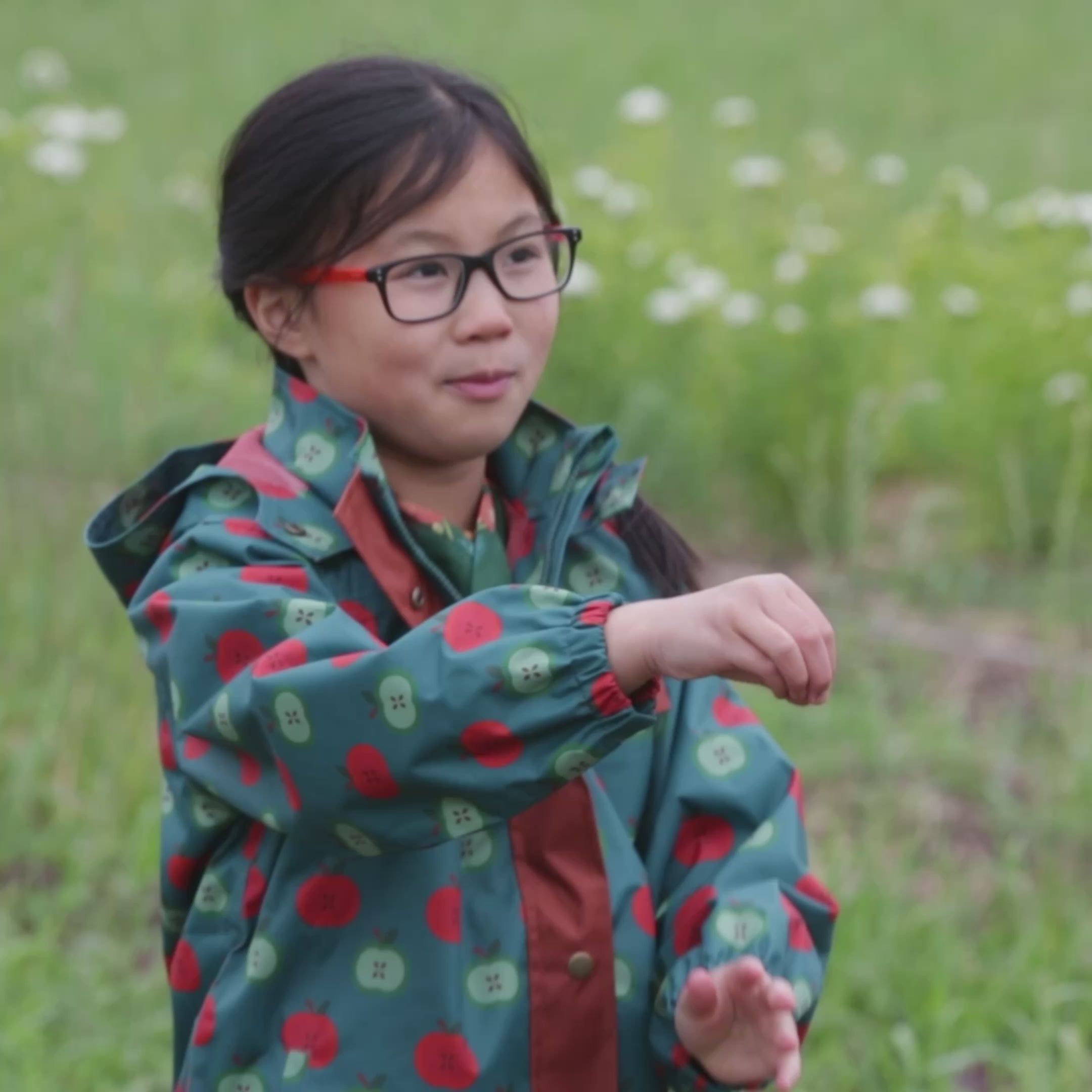 Load video: Apple Picking Recycled Waterproof Raincoat