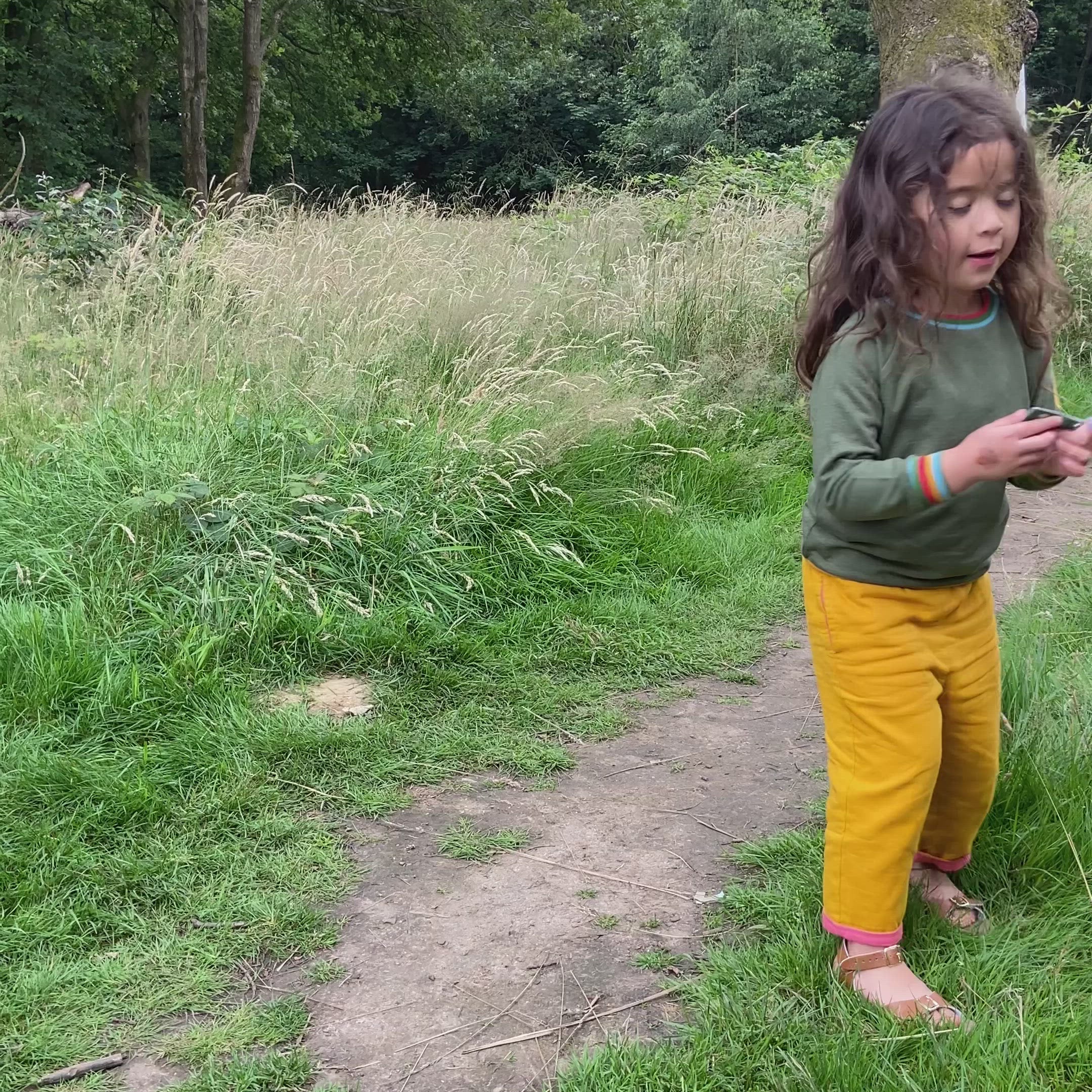 Load video: Green Marl Raglan Rainbow Sweatshirt